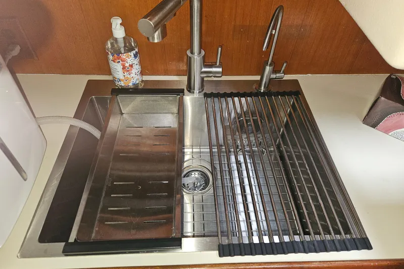 Slide: The Image of Stainless steel sink with drying rack in 1987 Morgan Classic 41 Center Cockpit yacht. - 25