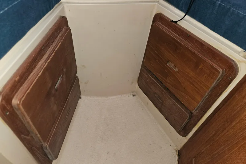Slide: The Image of Interior storage compartments on a 1987 Morgan Classic 41 Center Cockpit sailboat. - 40