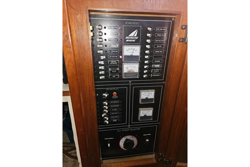 Slide: The Image of Electrical control panel on a 1987 Morgan Classic 41 Center Cockpit sailboat. - 48