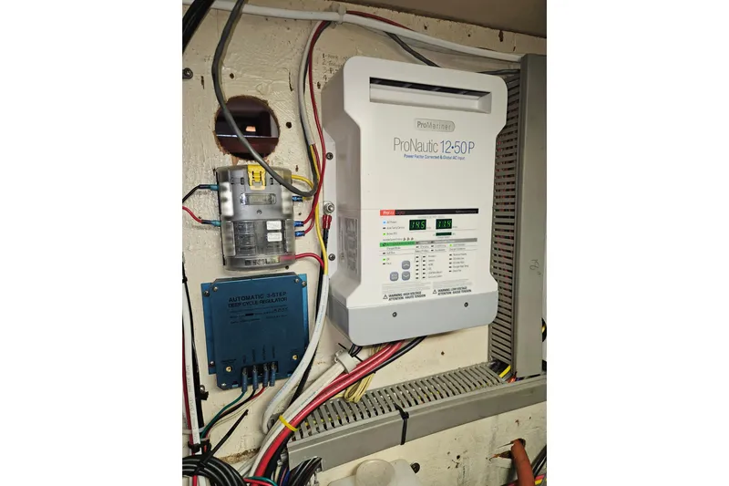 Slide: The Image of Electrical system with ProNautic 12-50P charger on 1987 Morgan Classic 41 Center Cockpit. - 50