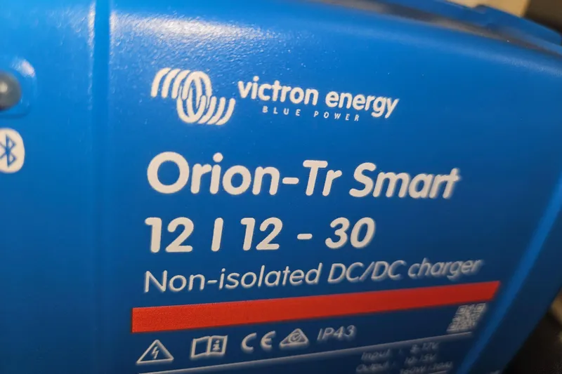 Slide: The Image of Victron Energy Orion-Tr Smart DC/DC charger, 12V 30A, non-isolated, blue casing. - 51