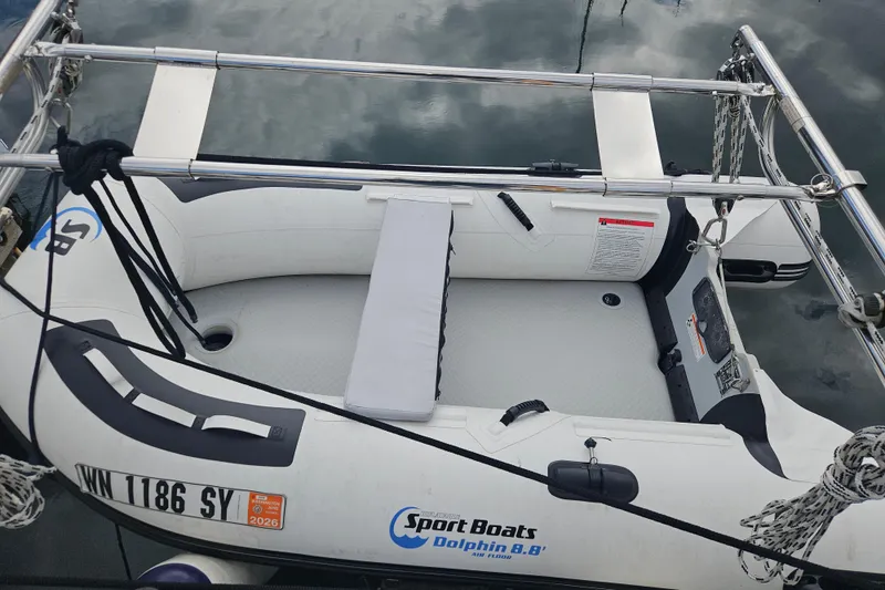 Slide: The Image of Inflatable boat secured on a 1987 Morgan Classic 41 Center Cockpit yacht. - 61