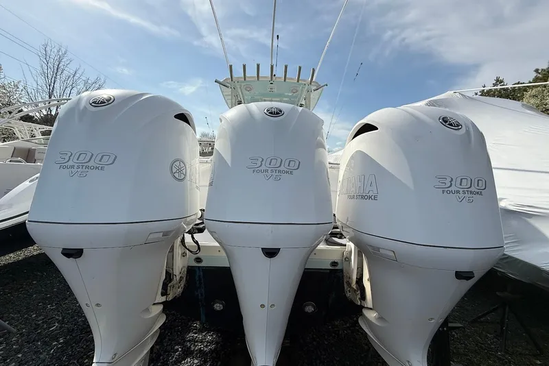 Slide: The Image of Triple Yamaha 300 V6 outboard engines on a 2017 Everglades 355 Center Console boat. - 20
