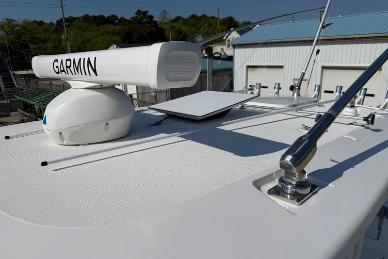 Slide: The Image of 2017 Everglades 355 Center Console boat with Garmin radar on deck. - 25
