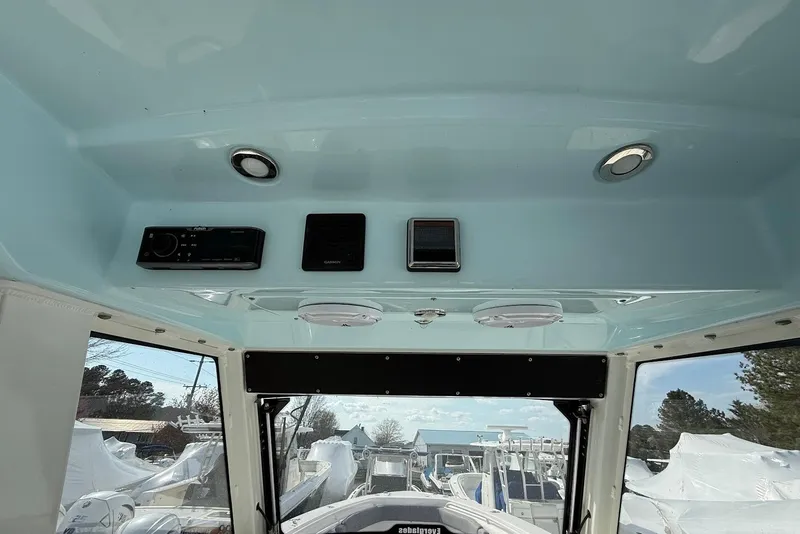 Slide: The Image of Interior view of 2017 Everglades 355 Center Console boat with electronic controls. - 9