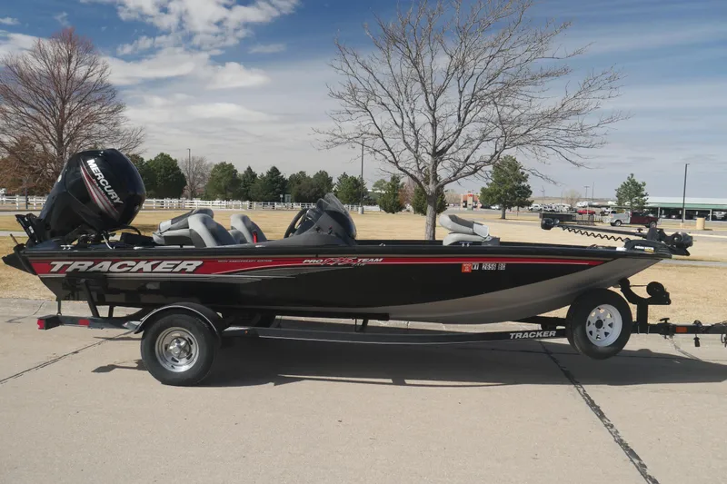 The Image of 2018 Tracker Pro Team 175 TXW boat on trailer, parked outdoors. - 0