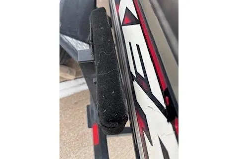 Slide: The Image of 2018 Tracker Pro Team 175 TXW boat detail with black and red graphics. - 14