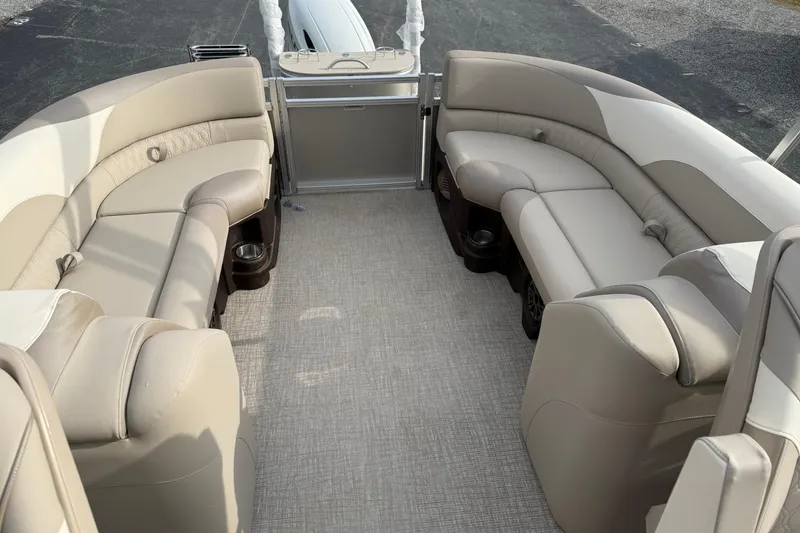 Slide: The Image of 2026 Avalon LSZ Quad Lounge interior with beige seating and cup holders. - 13