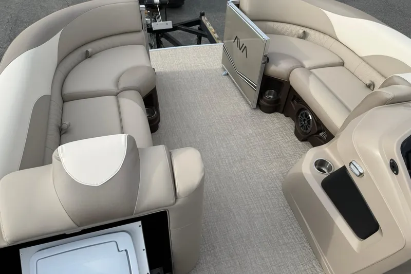 Slide: The Image of Luxurious seating on 2026 Avalon LSZ Quad Lounge pontoon boat, featuring elegant beige upholstery. - 16