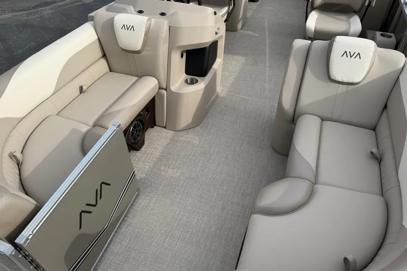 Slide: The Image of Luxurious interior of 2026 Avalon LSZ Quad Lounge pontoon boat with plush seating. - 7