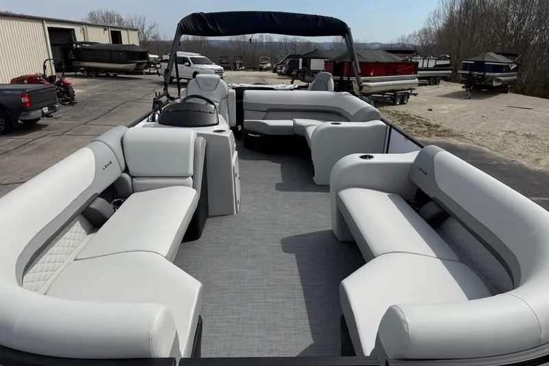 Slide: The Image of 2026 Lowe SF 232 Sport Fish pontoon boat with spacious seating and modern design. - 15