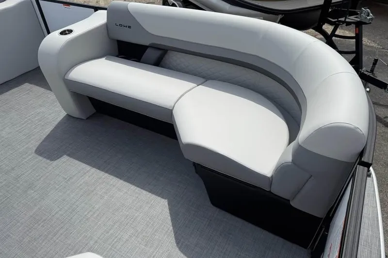 Slide: The Image of 2026 Lowe SF 232 Sport Fish boat with sleek, modern seating design. - 16