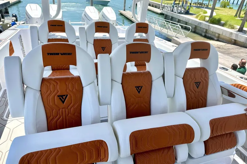 Slide: The Image of Luxurious seating in the 2026 Twin Vee 400 GFX2 CC boat. - 11