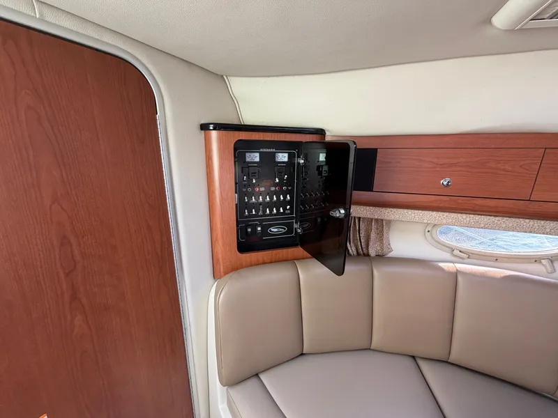 Slide: The Image of Interior of 2003 Chaparral 330 Signature with control panel. - 13