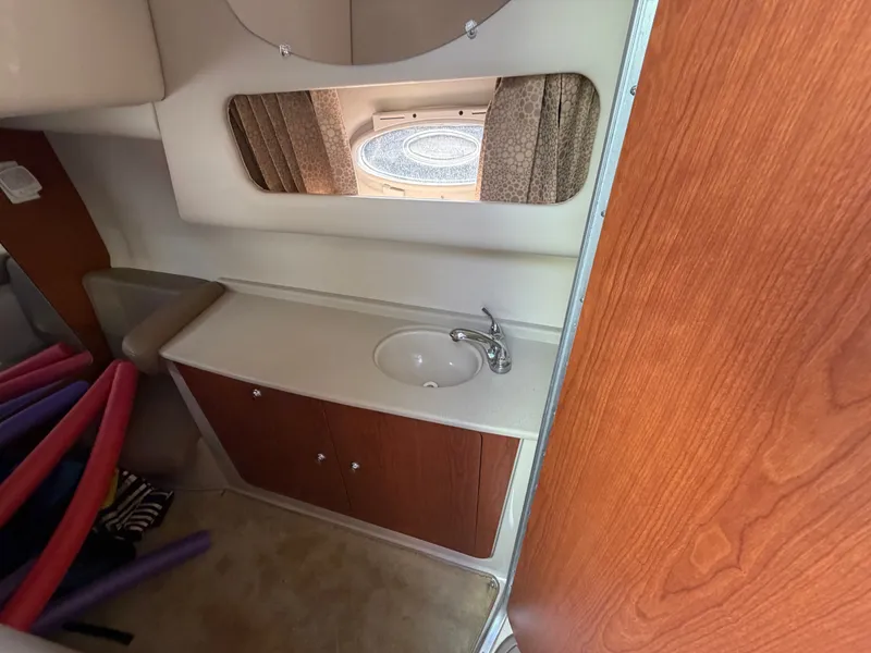 Slide: The Image of Interior of 2003 Chaparral 330 Signature with sink and window. - 18