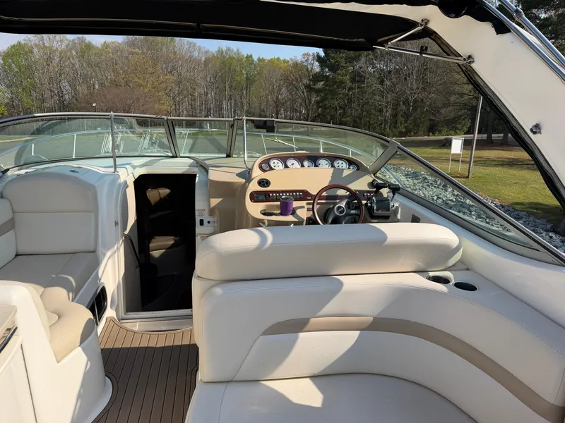 Slide: The Image of Interior of a 2003 Chaparral 330 Signature yacht with helm station. - 5