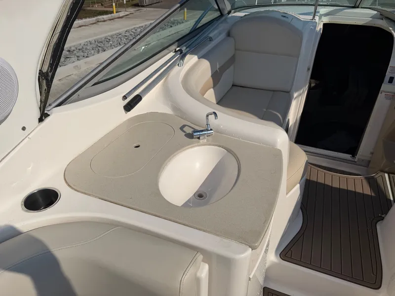 Slide: The Image of Interior of 2003 Chaparral 330 Signature with sink and seating area. - 9