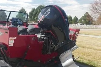 Slide: The Image of 2023 Ranger VS1882 WT boat with powerful outboard motor, parked outdoors. - 3