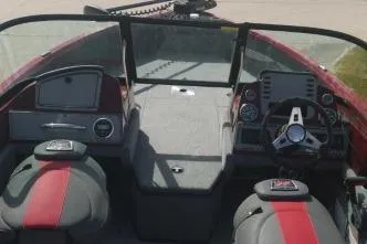 Slide: The Image of 2023 Ranger VS1882 WT boat interior with steering wheel and dashboard controls. - 5