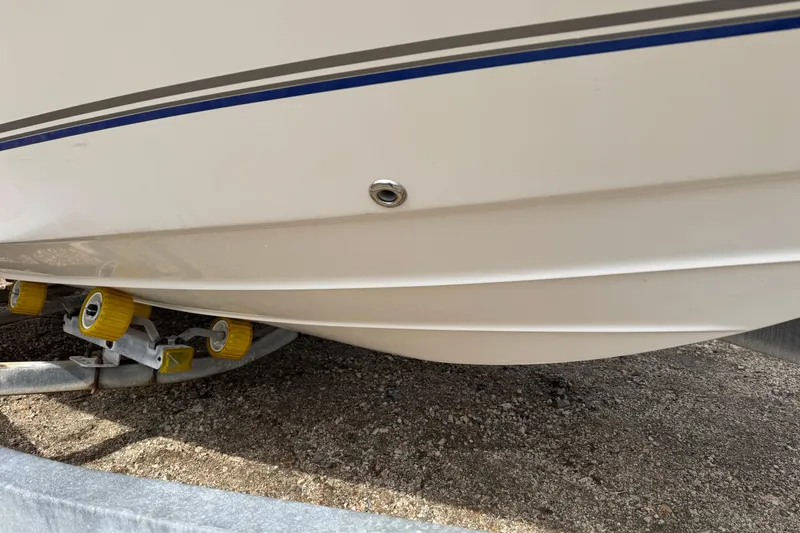 Slide: The Image of 2005 Campion Explorer 582 Center Console boat hull on trailer. - 3