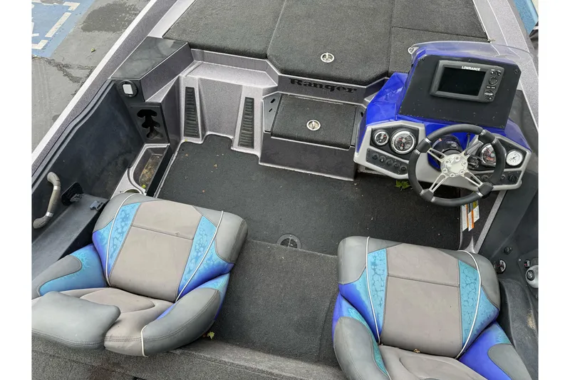 Slide: The Image of 2017 Ranger Z185 boat interior with dual seats, steering wheel, and control panel. - 22