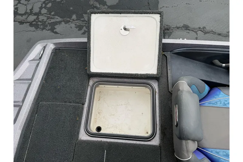 Slide: The Image of Open storage compartment on a 2017 Ranger Z185 boat deck. - 24