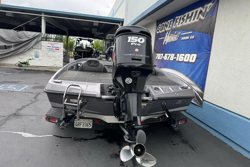 Slide: The Image of 2017 Ranger Z185 boat with 150 Pro motor at a service center. - 7