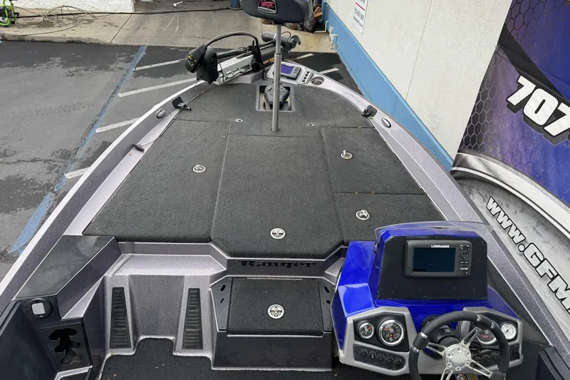 Slide: The Image of 2017 Ranger Z185 boat interior with steering console and fishing deck. - 8