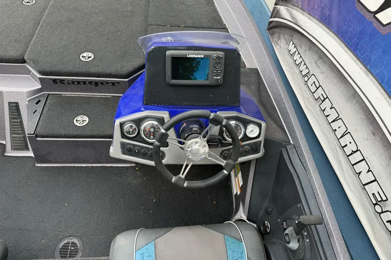 Slide: The Image of 2017 Ranger Z185 boat dashboard with steering wheel and Lowrance fishfinder. - 9