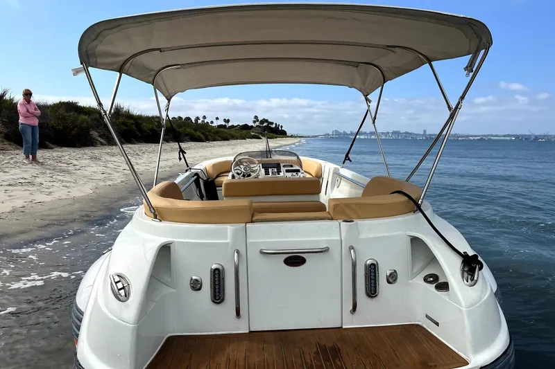 Slide: The Image of 2016 Castoldi jet tender docked on a sandy beach with a canopy. - 1