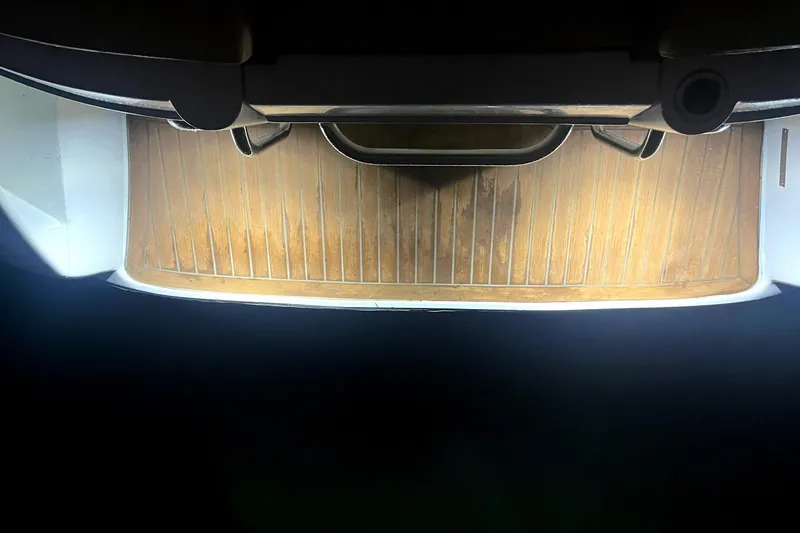 Slide: The Image of 2016 Castoldi jet tender with illuminated wooden deck at night. - 10