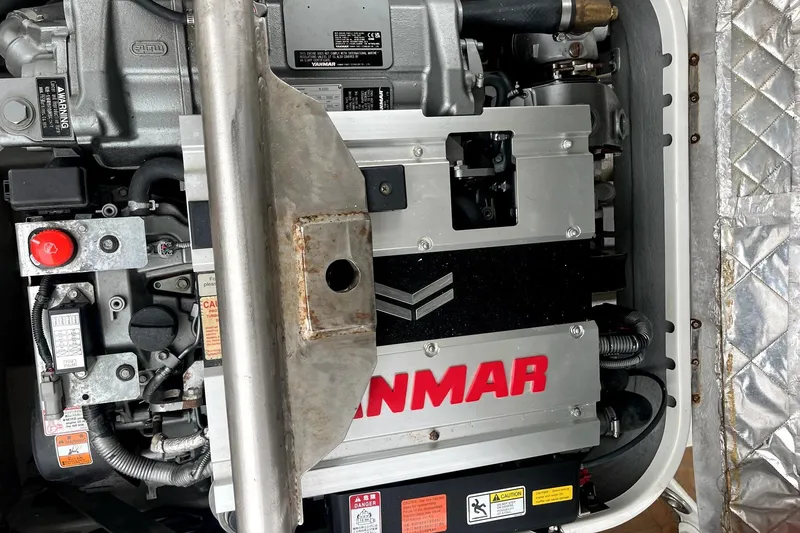 Slide: The Image of Engine compartment of a 2016 Castoldi jet tender featuring a Yanmar engine. - 14