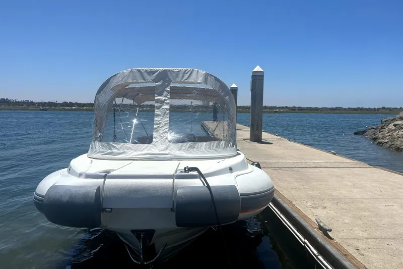 Slide: The Image of 2016 Castoldi jet tender docked by a pier on a sunny day. - 6