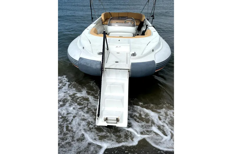 Slide: The Image of 2016 Castoldi jet tender with extended boarding ramp on the water. - 7