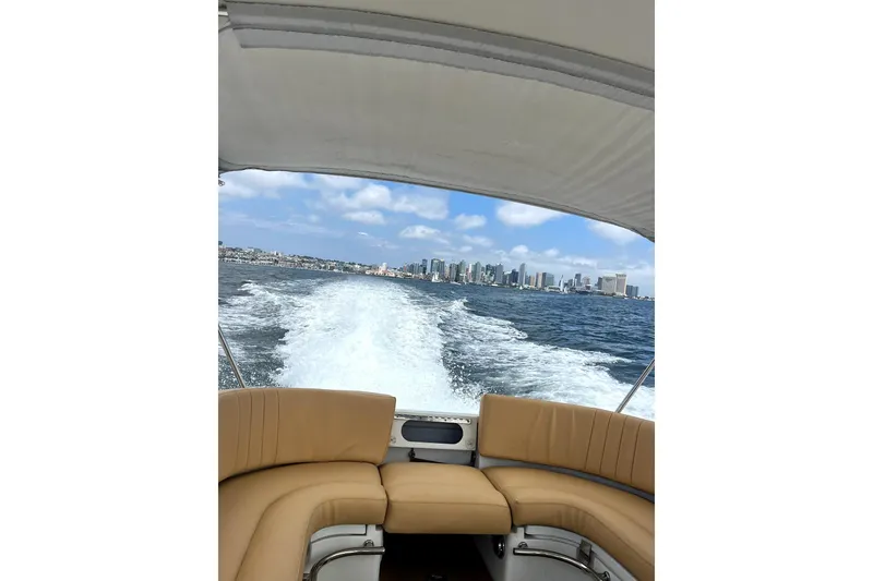 Slide: The Image of 2016 Castoldi jet tender cruising with city skyline in the background. - 8