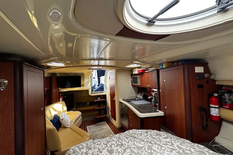 Slide: The Image of Luxurious interior of a 2007 Monterey 330 Sport Yacht with modern amenities. - 26