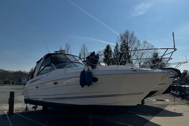 Slide: The Image of 2007 Monterey 330 Sport Yacht on dry dock under clear blue sky. - 5