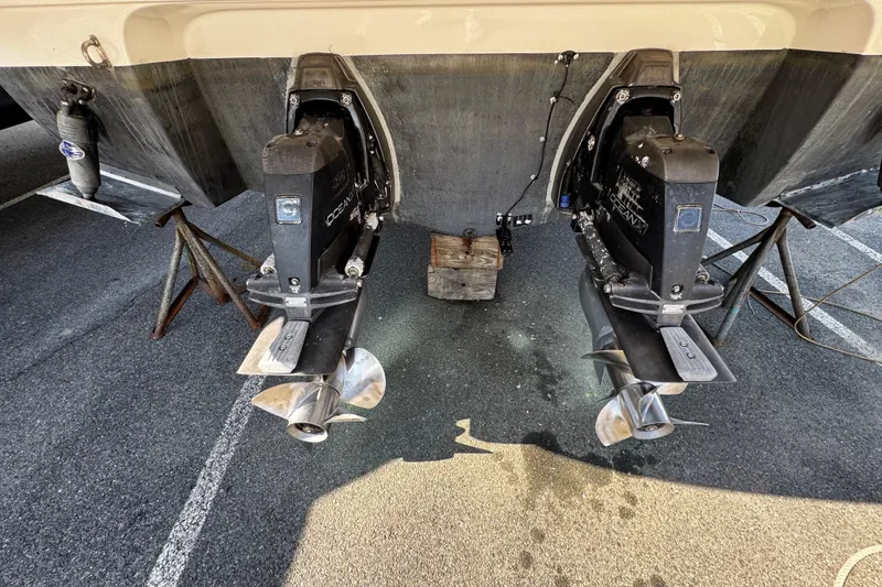 Slide: The Image of 2007 Monterey 330 Sport Yacht with dual outboard motors on display. - 8