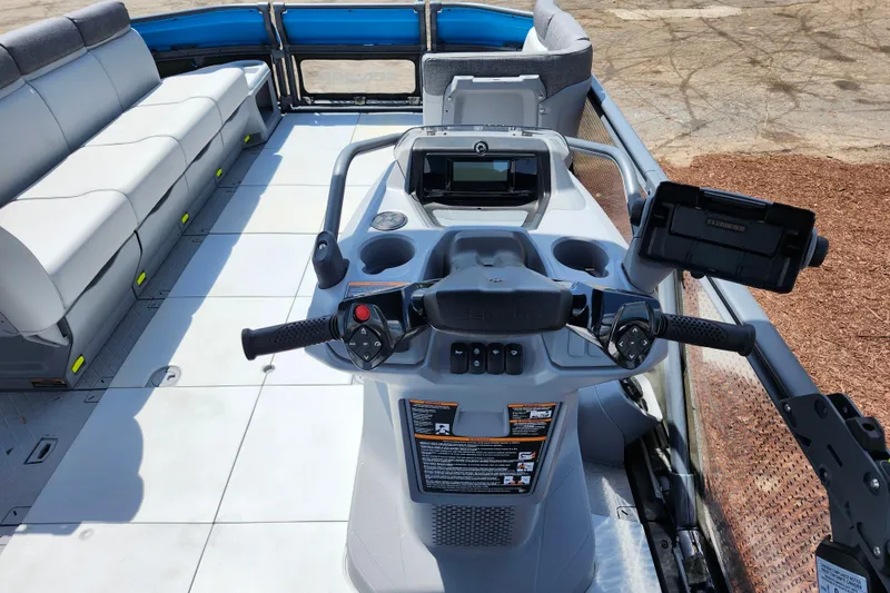 Slide: The Image of 2023 Sea-Doo Switch Cruise 21 dashboard with seating and controls. - 17