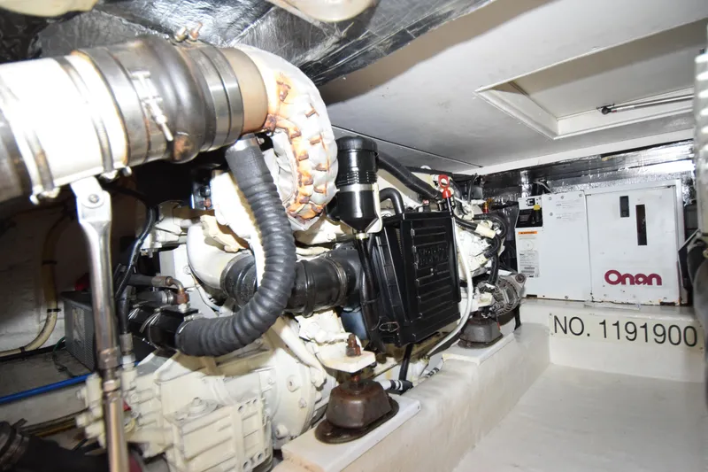Slide: The Image of Engine room of 2005 Riviera 33 Open Flybridge with Onan generator. - 28
