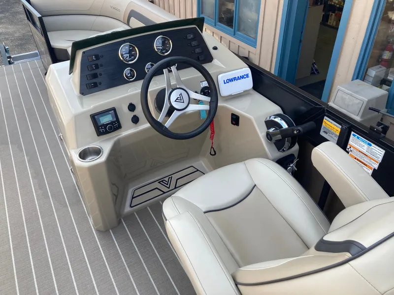 Slide: The Image of Viaggio Lago 22R 2023 helm with Lowrance device. - 13