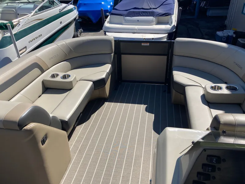 Slide: The Image of Interior of Viaggio Lago 22R boat, 2023 model, featuring comfortable seating. - 19