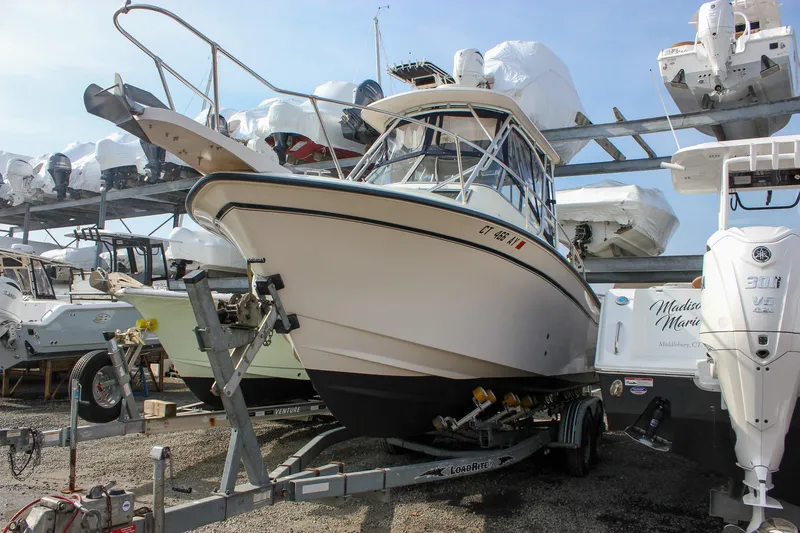 Slide: The Image of 2002 Grady-White Islander 270 boat on trailer in marina storage. - 10