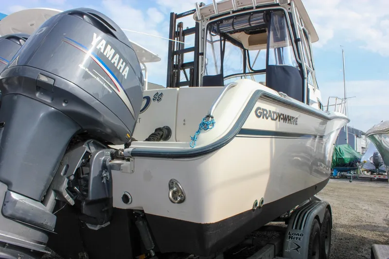 Slide: The Image of 2002 Grady-White Islander 270 boat with Yamaha outboard motor on trailer. - 7