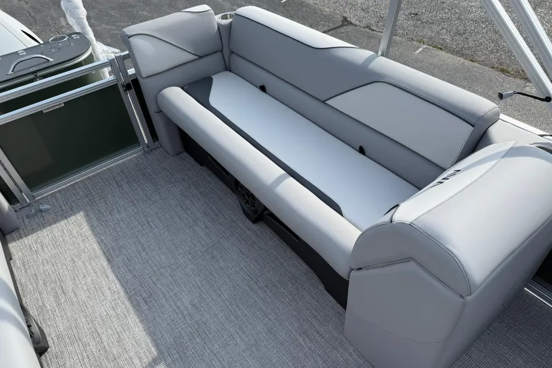 Slide: The Image of 2026 Avalon Venture Quad Lounge boat interior with sleek gray seating and modern design. - 11