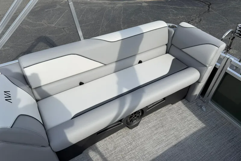Slide: The Image of Luxurious seating on 2026 Avalon Venture Quad Lounge pontoon boat, featuring sleek gray upholstery. - 16