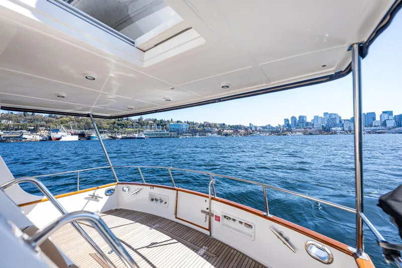 Slide: The Image of View from 2006 Grand Banks 47 Europa yacht, overlooking city skyline and blue waters. - 19
