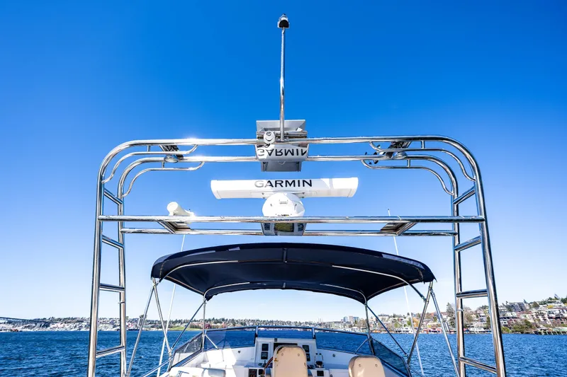 Slide: The Image of 2006 Grand Banks 47 Europa yacht with Garmin radar, cruising on a sunny day. - 26
