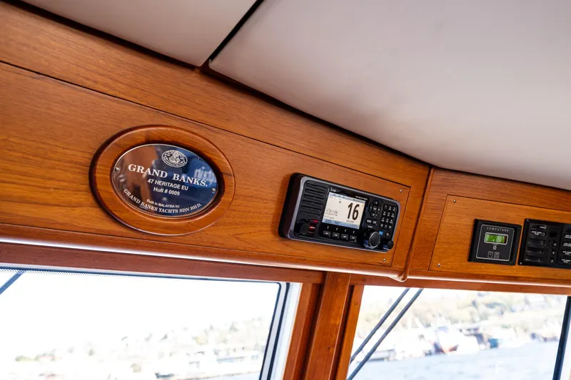 Slide: The Image of Interior of 2006 Grand Banks 47 Europa yacht with navigation equipment and nameplate. - 40