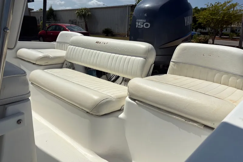 Slide: The Image of 2005 Sea Pro 190 Center Console boat with Yamaha 150 engine, featuring white seating. - 10